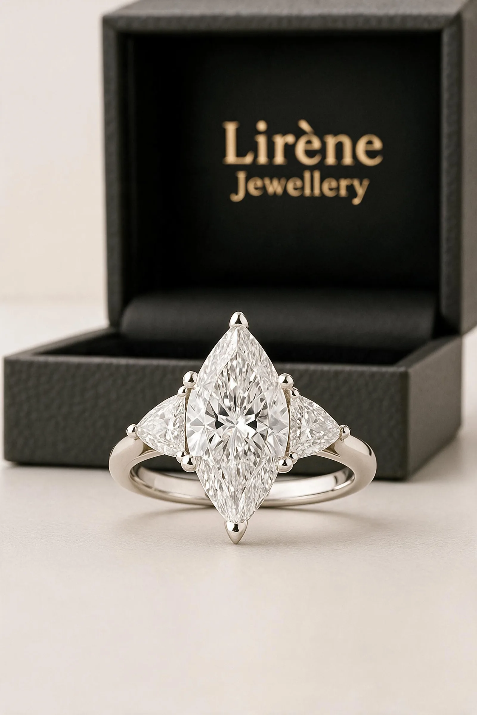 A marquise-cut lab-grown diamond ring presented in its LIRÈNE box